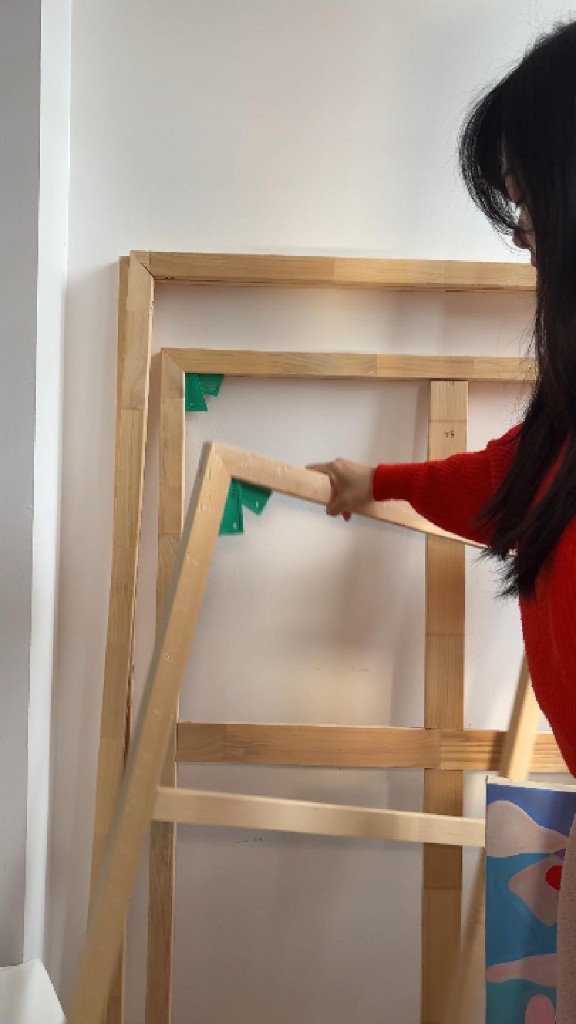 Stretching a canvas in the studio
